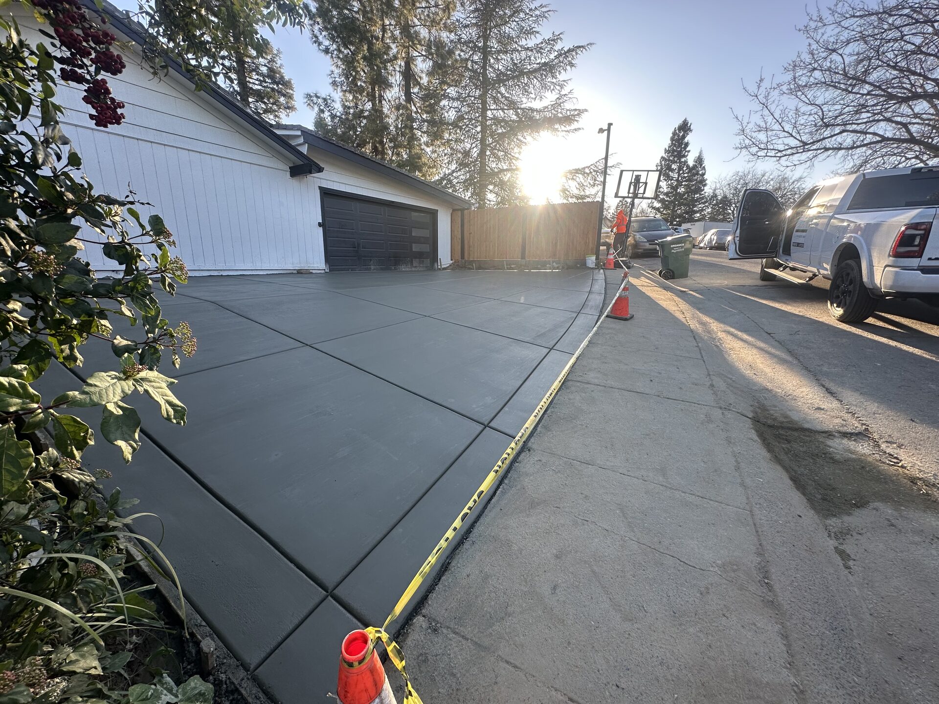 Freshly finished charcoal colored driveway