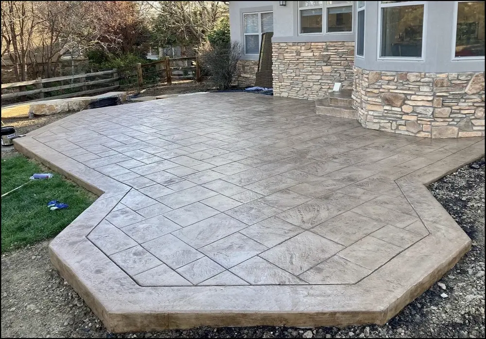 Stamped concrete patio with stone pattern